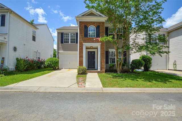 view of front of home with brick siding, driveway, a front yard, and an attached garage
