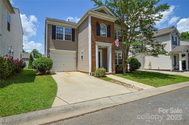 view of front of house featuring an attached garage, a front lawn, and driveway