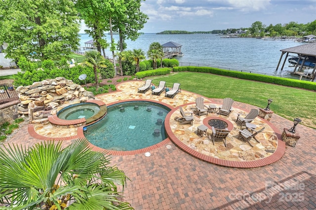 16909 Jetton Rd, Cornelius, NC 28031 - view of pool with a patio area, a fire pit, a water view, and a pool with connected hot tub