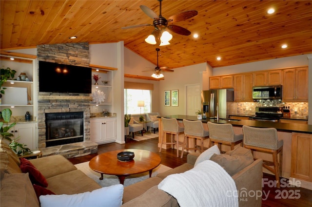 220 Woodwinds Ln, Seven Devils, NC 28604 - living room with ceiling fan, wood ceiling, dark wood-type flooring, lofted ceiling, and a fireplace