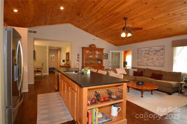 220 Woodwinds Ln, Seven Devils, NC 28604 - kitchen with stainless steel refrigerator with ice dispenser, a sink, vaulted ceiling, dark countertops, and wooden ceiling