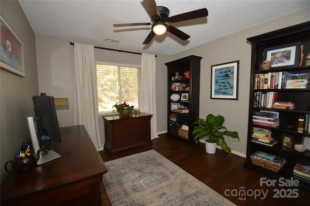 220 Woodwinds Ln, Seven Devils, NC 28604 - home office with a ceiling fan, dark wood-type flooring, a textured ceiling, and baseboards