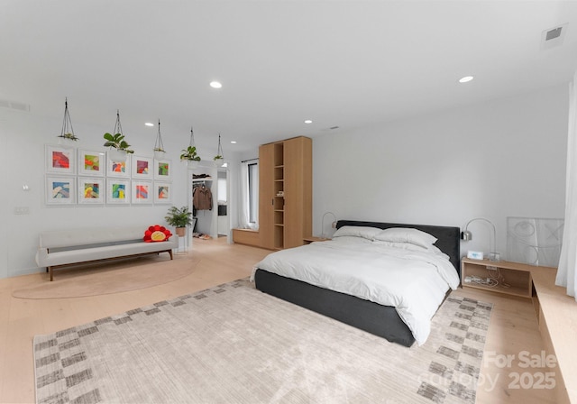 2913 Lake Ave, Charlotte, NC 28208 - bedroom with recessed lighting and wood finished floors
