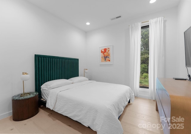 2913 Lake Ave, Charlotte, NC 28208 - bedroom with recessed lighting, baseboards, and light wood-type flooring