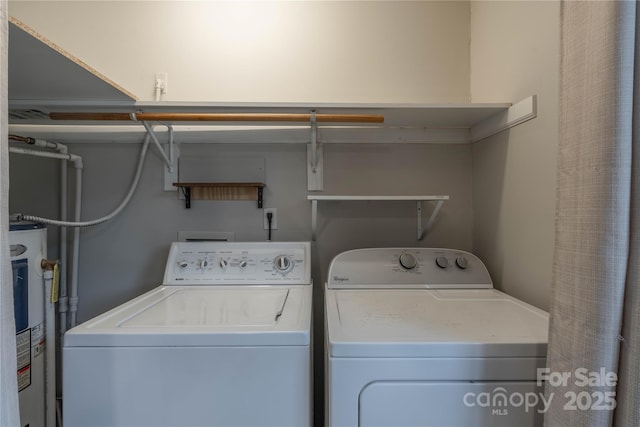 133 Pheasant Run Rd, Troutman, NC 28166 - laundry area with washing machine and clothes dryer