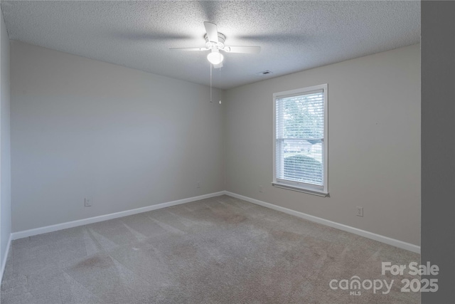 133 Pheasant Run Rd, Troutman, NC 28166 - unfurnished room with a ceiling fan, carpet flooring, baseboards, and a textured ceiling