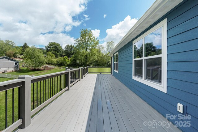 123 Dapple Rd, Candler, NC 28715 - wooden terrace featuring a lawn