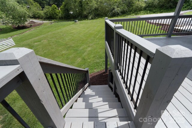 123 Dapple Rd, Candler, NC 28715 - wooden terrace featuring a lawn