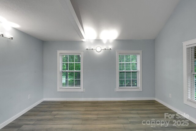123 Dapple Rd, Candler, NC 28715 - spare room featuring wood finished floors and baseboards