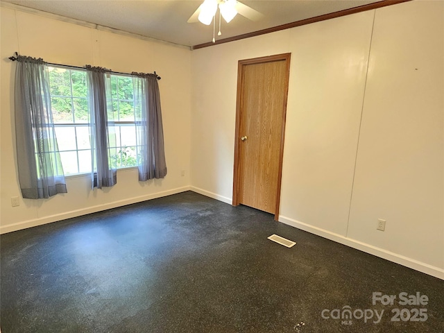 3191 Piedmont Rd, Morganton, NC 28655 - empty room with a ceiling fan and baseboards