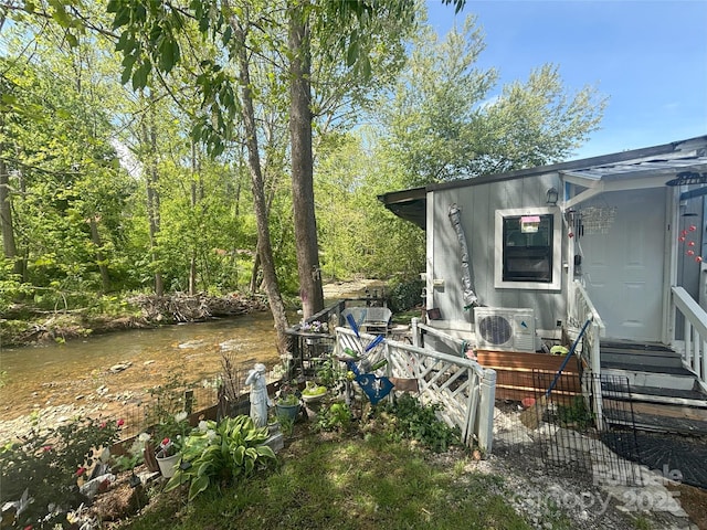 view of yard with a cooling unit and entry steps
