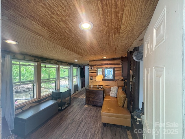 sunroom / solarium featuring wood ceiling, wood finished floors, and recessed lighting