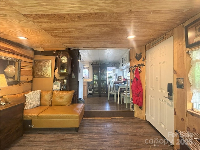 foyer featuring wood ceiling and wood finished floors