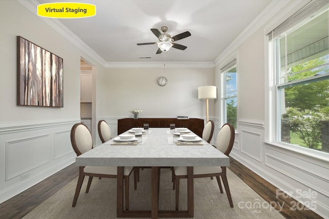 145 Yellow Birch Loop, Mooresville, NC 28117 - dining area with dark wood finished floors, a ceiling fan, crown molding, wainscoting, and a decorative wall