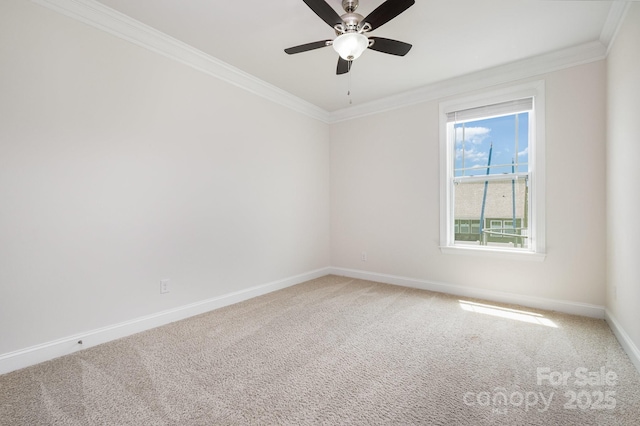 145 Yellow Birch Loop, Mooresville, NC 28117 - spare room featuring crown molding, carpet floors, baseboards, and ceiling fan