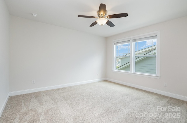 145 Yellow Birch Loop, Mooresville, NC 28117 - unfurnished room featuring light carpet, baseboards, and a ceiling fan