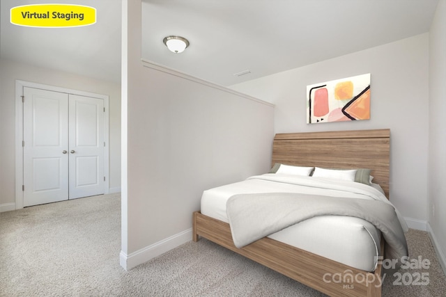 145 Yellow Birch Loop, Mooresville, NC 28117 - bedroom with carpet floors, baseboards, and a closet
