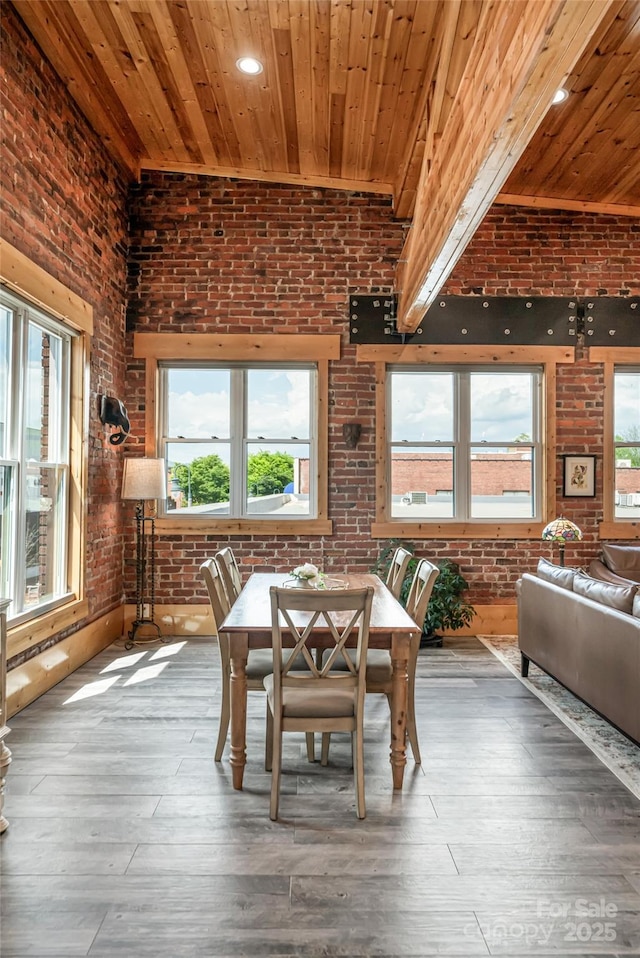 14 N Main St Unit 2, Waynesville, NC 28786 - dining area with brick wall, wood ceiling, healthy amount of natural light, and hardwood / wood-style floors