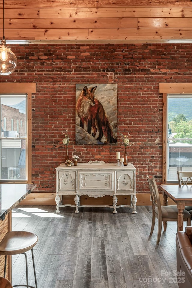 14 N Main St Unit 2, Waynesville, NC 28786 - sitting room with hardwood / wood-style flooring, wooden ceiling, and brick wall