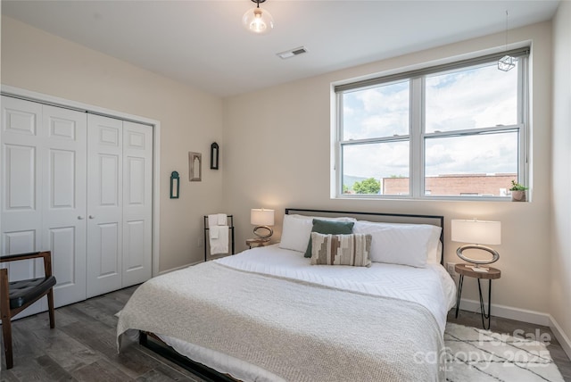 14 N Main St Unit 2, Waynesville, NC 28786 - bedroom with wood finished floors, a closet, and baseboards