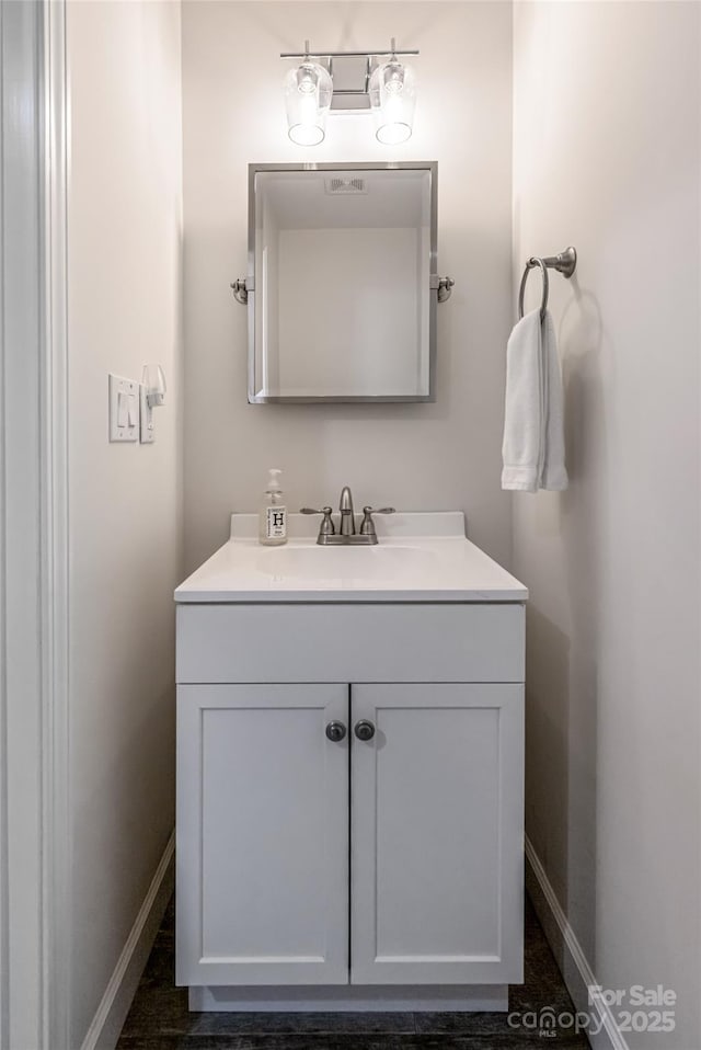 14 N Main St Unit 2, Waynesville, NC 28786 - bathroom with vanity and baseboards