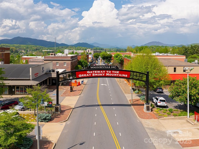 14 N Main St Unit 2, Waynesville, NC 28786 - view of asphalt street with a mountain view, curbs, sidewalks, and street lighting