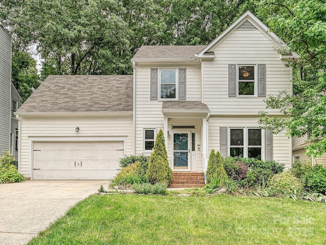 4315 Poplar Grove Dr, Charlotte, NC 28269 - traditional-style house with an attached garage, roof with shingles, concrete driveway, and a front yard