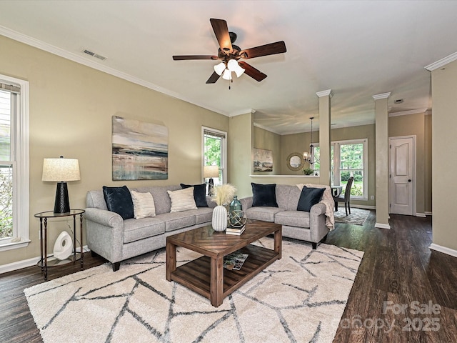 4315 Poplar Grove Dr, Charlotte, NC 28269 - living room with baseboards, healthy amount of natural light, dark wood-type flooring, and crown molding