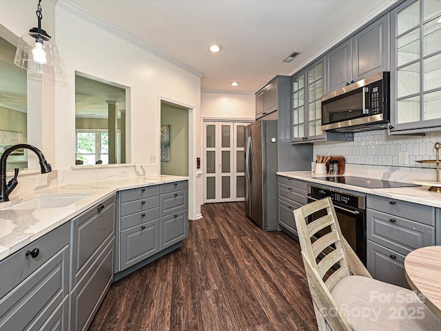4315 Poplar Grove Dr, Charlotte, NC 28269 - kitchen featuring gray cabinets, black appliances, a sink, crown molding, and dark wood finished floors
