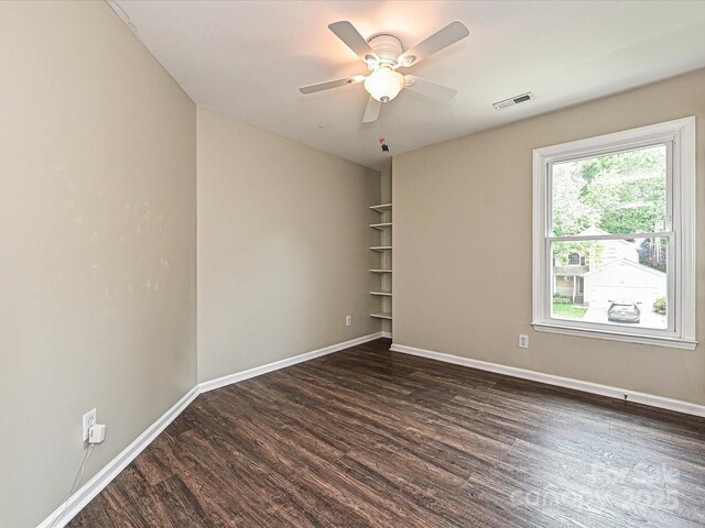 4315 Poplar Grove Dr, Charlotte, NC 28269 - unfurnished room featuring dark wood-style flooring, baseboards, and ceiling fan