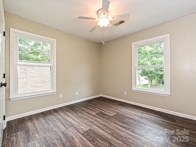 4315 Poplar Grove Dr, Charlotte, NC 28269 - unfurnished room with plenty of natural light, dark wood finished floors, baseboards, and ceiling fan