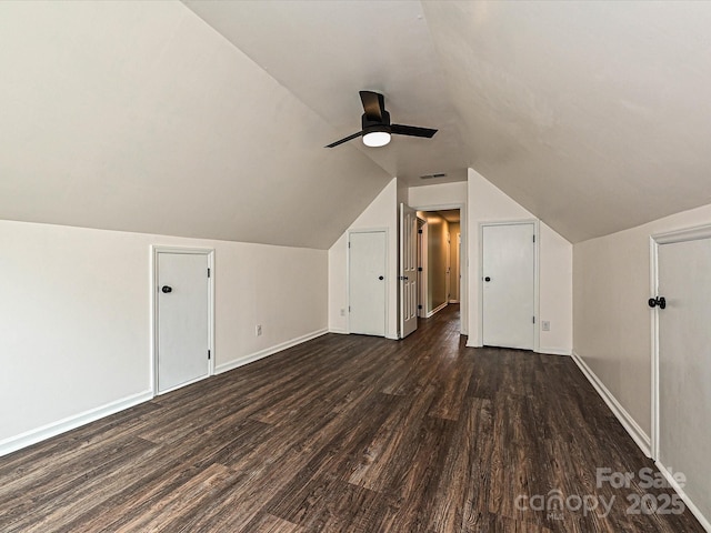 4315 Poplar Grove Dr, Charlotte, NC 28269 - bonus room featuring a ceiling fan, dark wood finished floors, baseboards, and vaulted ceiling