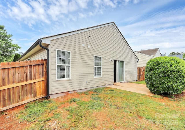 back of house featuring a patio area
