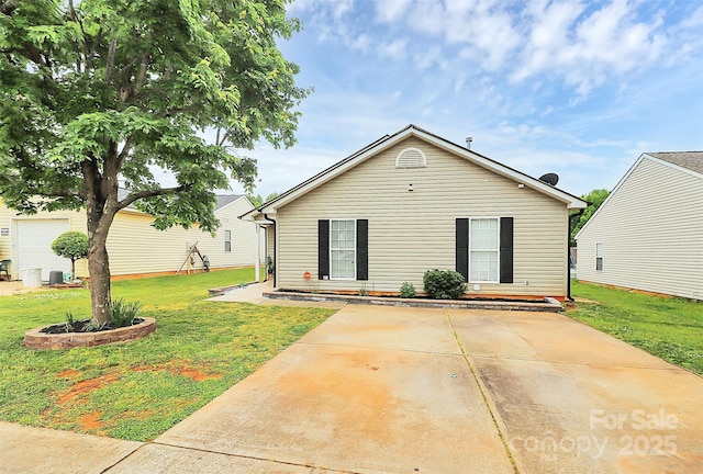 rear view of house with a yard