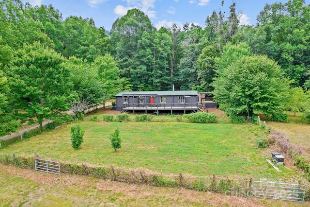 view of front of property with a wooden deck
