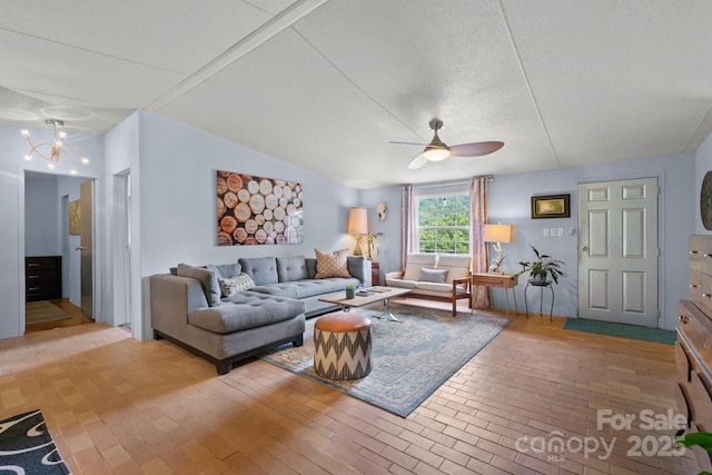 living area with ceiling fan