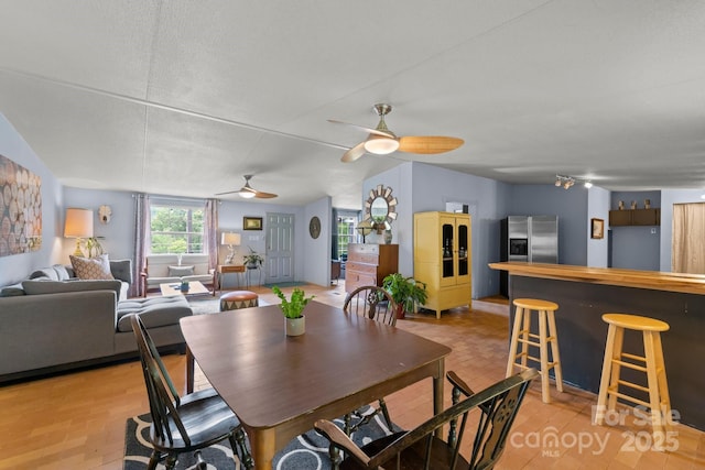dining room featuring ceiling fan