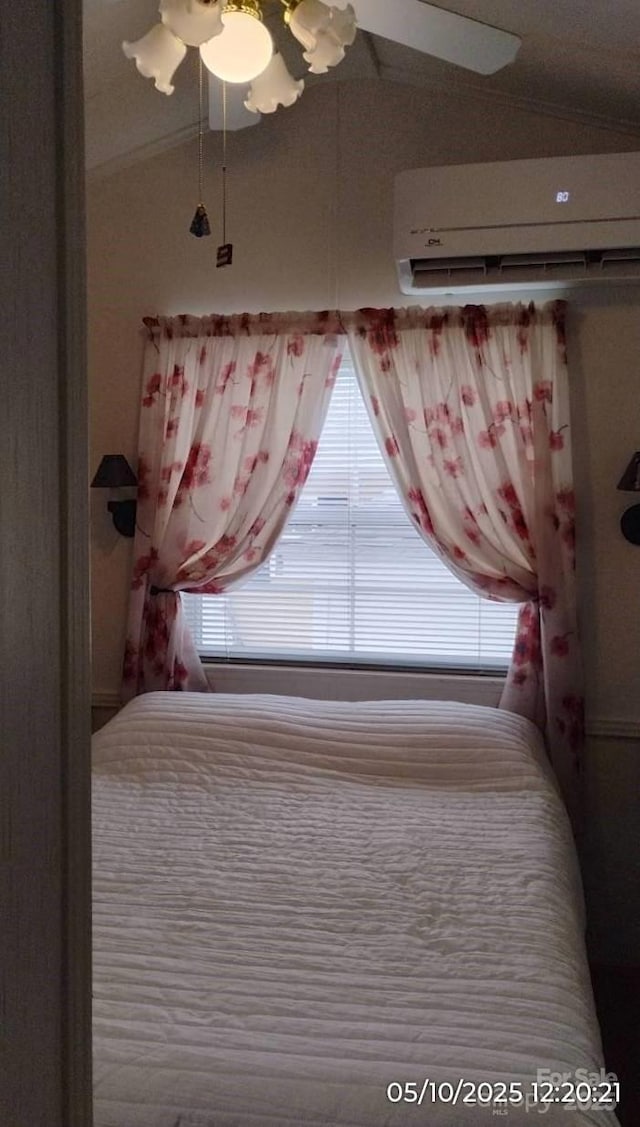 unfurnished bedroom featuring a wall mounted AC and ceiling fan