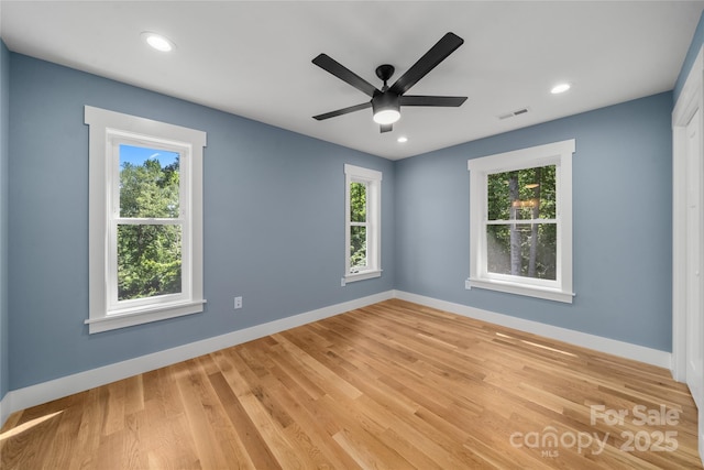 68 Bamboo Trl, Candler, NC 28715 - empty room featuring baseboards, light wood-type flooring, a ceiling fan, and recessed lighting