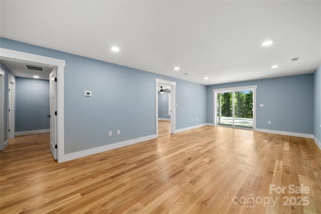 68 Bamboo Trl, Candler, NC 28715 - empty room featuring recessed lighting, light wood-type flooring, and baseboards