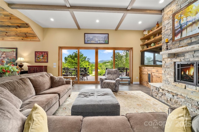 134 Olivia Trace Dr, Fletcher, NC 28732 - living room with recessed lighting, beamed ceiling, wood finished floors, and a stone fireplace
