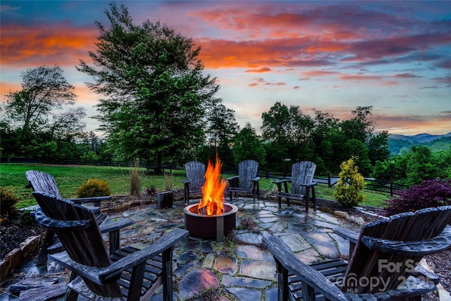 134 Olivia Trace Dr, Fletcher, NC 28732 - patio terrace at dusk with an outdoor fire pit and a patio