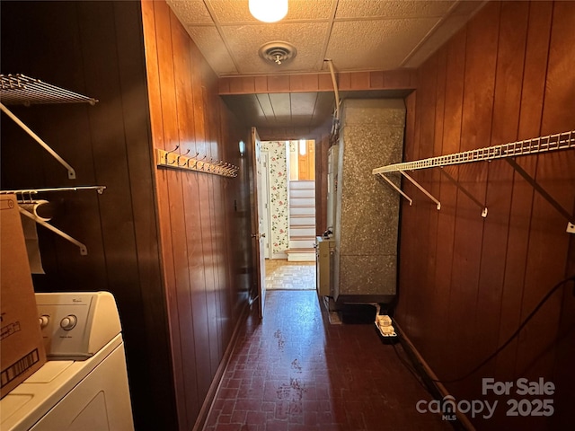 5495 Valley Run St, Hickory, NC 28601 - laundry room with washer / clothes dryer, brick patterned flooring, and wood walls