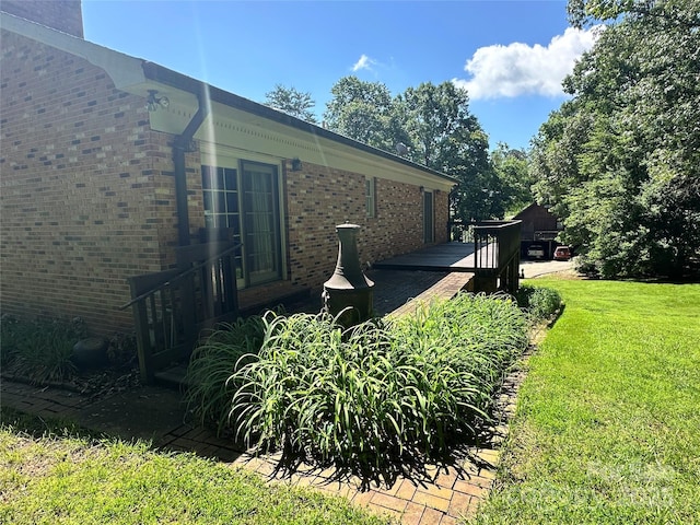 5495 Valley Run St, Hickory, NC 28601 - view of property exterior with brick siding, a yard, and a deck