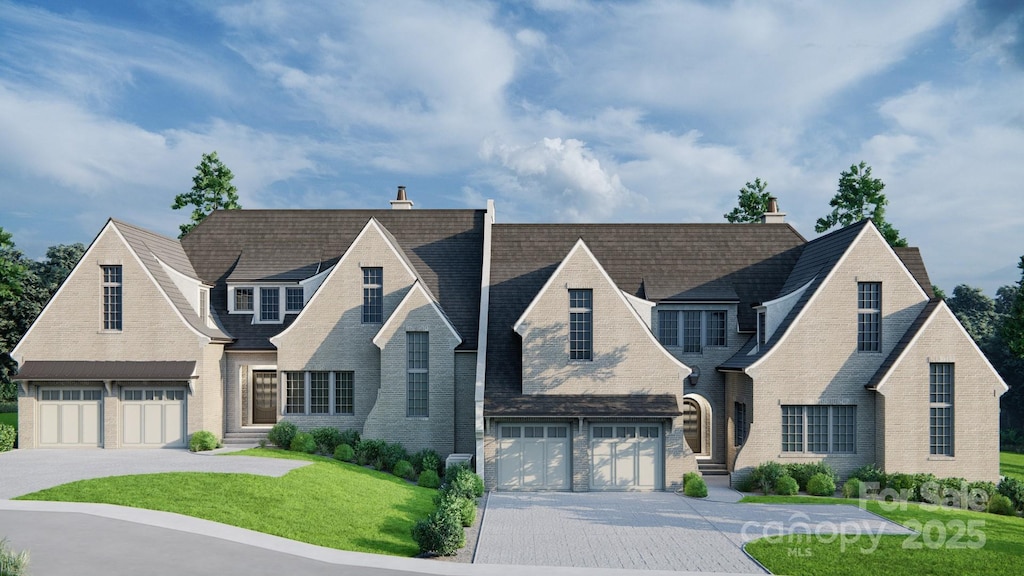 2113 Brandon Cir, Charlotte, NC 28211 - view of front of house with a garage, driveway, a front lawn, and a chimney