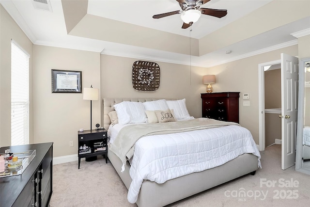 10378 Alexander Martin Ave, Charlotte, NC 28277 - bedroom featuring light carpet, a raised ceiling, baseboards, crown molding, and a ceiling fan