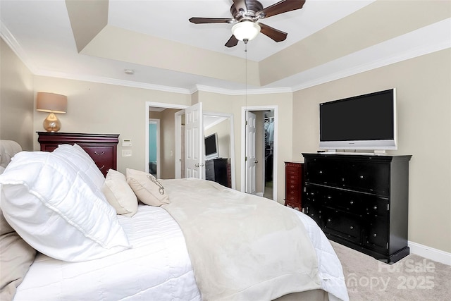 10378 Alexander Martin Ave, Charlotte, NC 28277 - carpeted bedroom with a raised ceiling, a walk in closet, a closet, ceiling fan, and baseboards