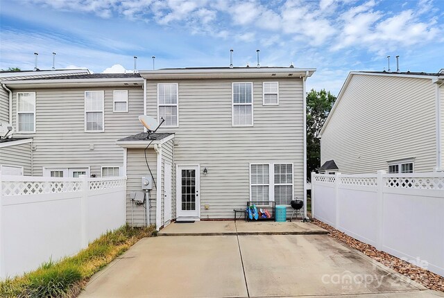 10378 Alexander Martin Ave, Charlotte, NC 28277 - rear view of house with a patio area and fence
