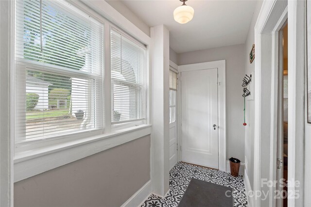 415 Norwood St SW, Lenoir, NC 28645 - doorway with baseboards