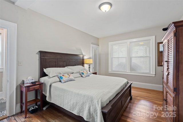 415 Norwood St SW, Lenoir, NC 28645 - bedroom featuring wood finished floors and baseboards